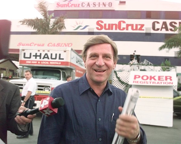 Staff Photo Ursula E. Seemann A Broward County Sheriff's department investigation resulted in the seizure of six South Florida Gambling ships including the SunCruz VI which sails out of Hollywood. Photo shows Konstantinos "Gus" Boulis the owner of the SunCruz boat declining at that moment an interview, he said," I am busy listening to this B.S." as he walked toward Jenne and Butterworth's press conference.