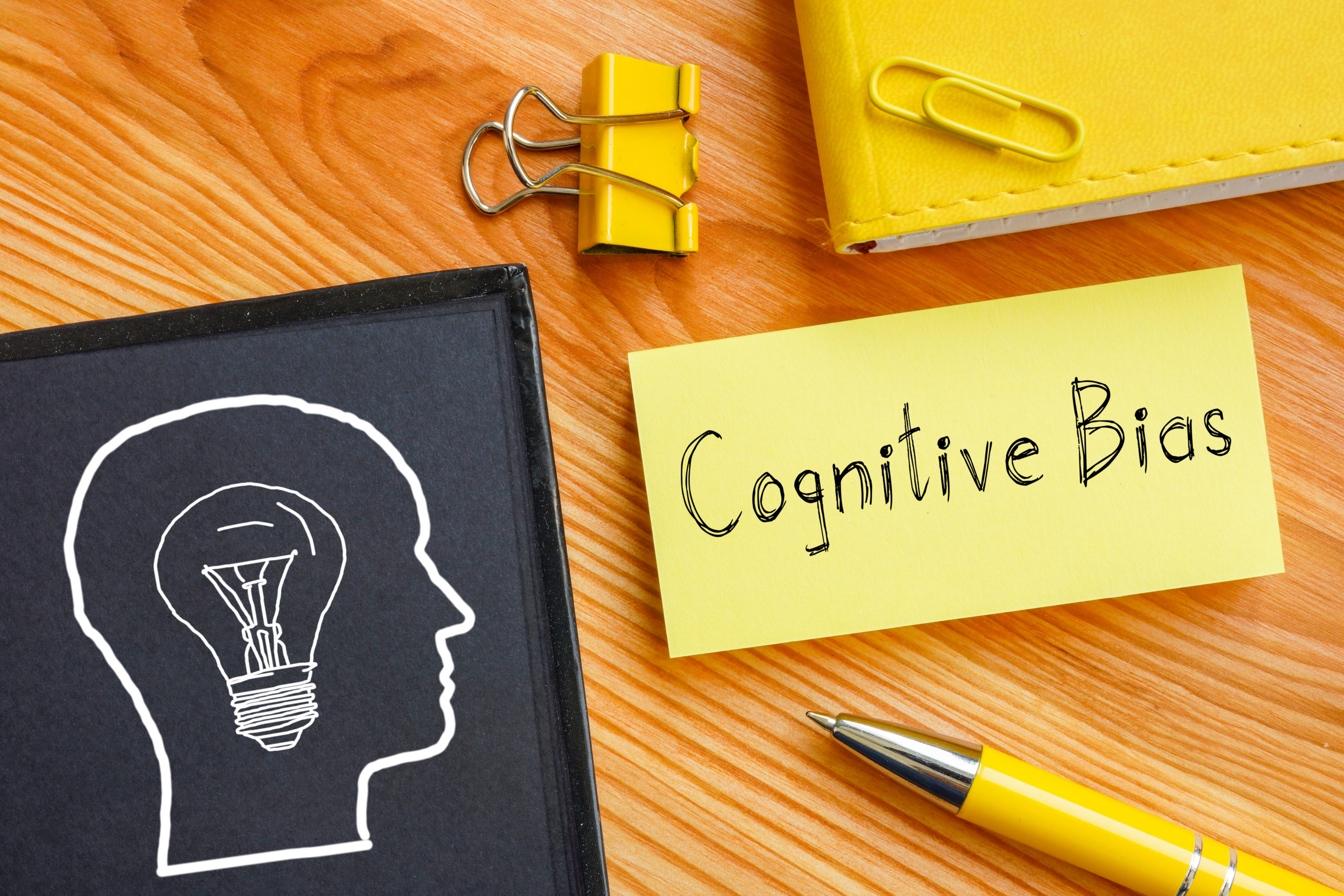 Cognitive Bias is shown on the photo using the text